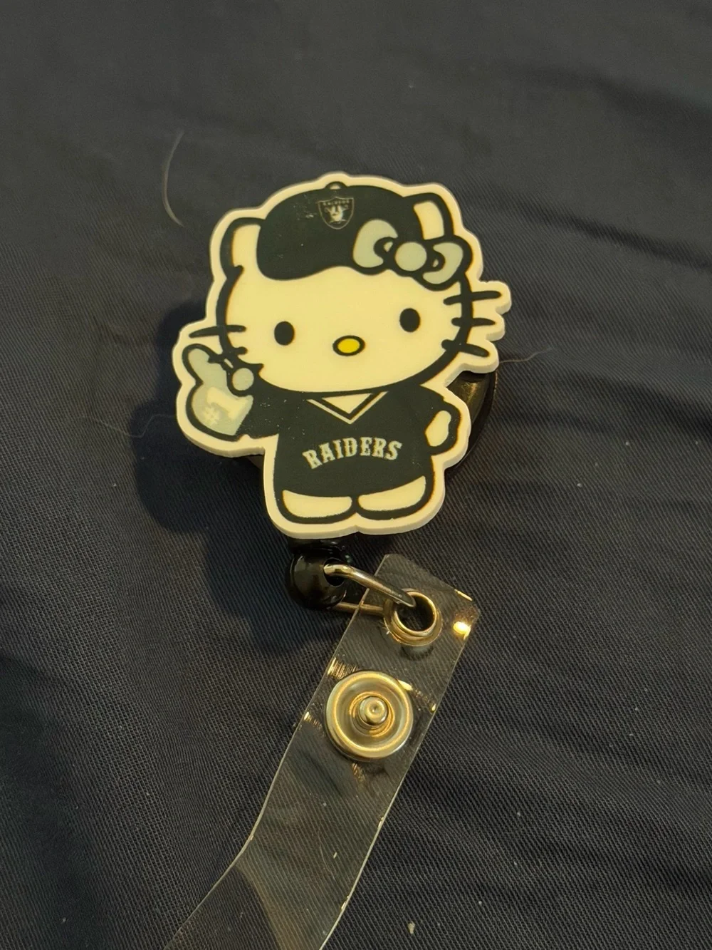 Hello Kitty x Raiders Black Badge Reel - Accessories
